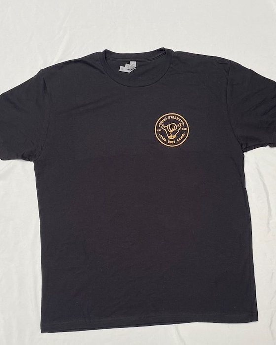 Front of the t-shirt with the small gold logo
